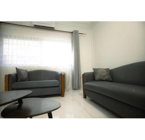 Posezení v ubytování DAA DINGBE SUITES - Luxury Two Bedroom Apartments