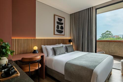 Postel nebo postele na pokoji v ubytování Heiss Hotel