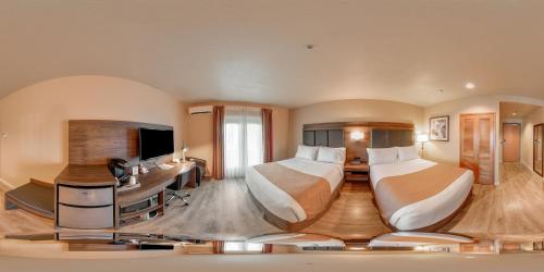 Cama o camas de una habitación en Inn at Port Gardner-Everett Waterfront, Ascend Hotel Collection