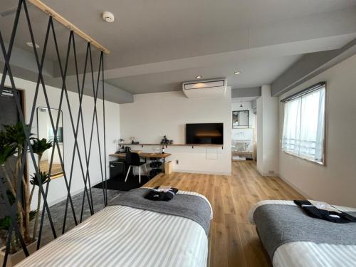 Postel nebo postele na pokoji v ubytování Fukuyama Royal Hotel