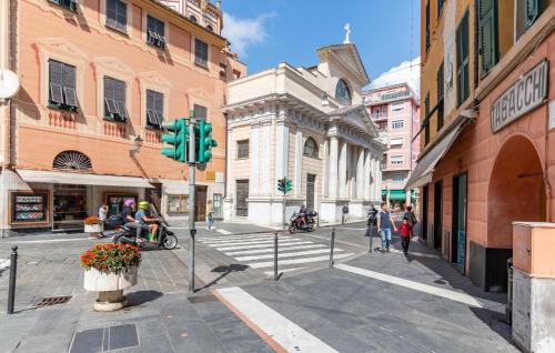 a city street with a traffic light and buildings at Amazing Apartment In Recco With Kitchen in Recco