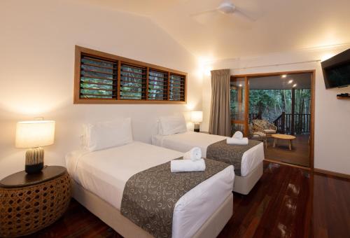 Letto o letti in una camera di Thala Beach Nature Reserve