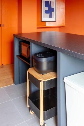 a kitchen with a counter with a appliance under it at Villa Secca in Futo