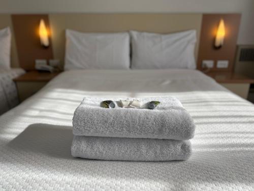 Postel nebo postele na pokoji v ubytování Motel Margeurita