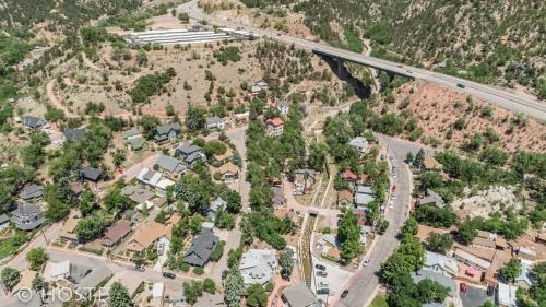 an aerial view of a small town with houses and a road at 3BR Manitou Springs 2min to Restaurants Hot Tub in Manitou Springs