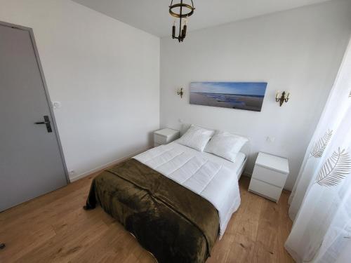 Appartement 2 chambres avec terrasse et garage privatif proche plage