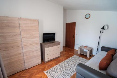 TV a/nebo společenská místnost v ubytování Apartment Magdalena