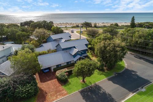 an aerial view of a house with the ocean in the background at Dunsborough Beach Villa in Quindalup