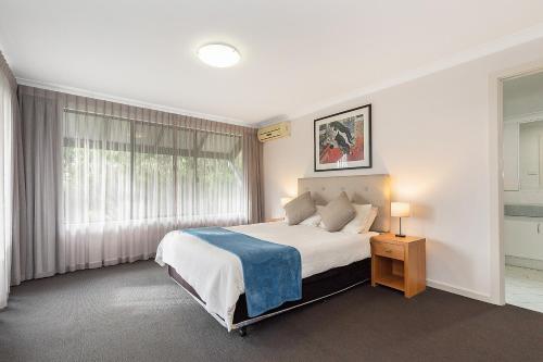 Ένα ή περισσότερα κρεβάτια σε δωμάτιο στο Dunsborough Beach Villa