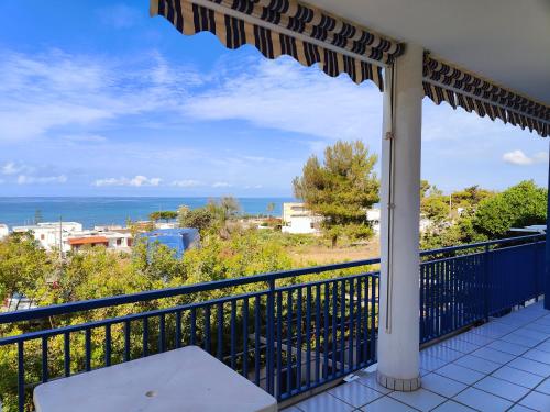 a balcony with a view of the ocean at Villetta Blu Mare in Torre Vado