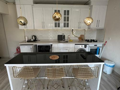Kuchyň nebo kuchyňský kout v ubytování Golden Hour Apartment بورصة شقة مريحة Bursa Nilufer مَنْظَرٌ جَمِيلٌ