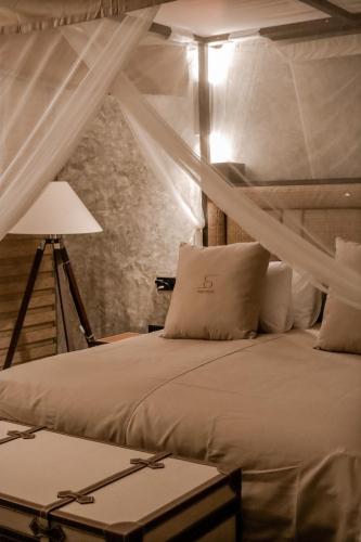 Cama o camas de una habitación en Aarunya Nature Resort - Kandy
