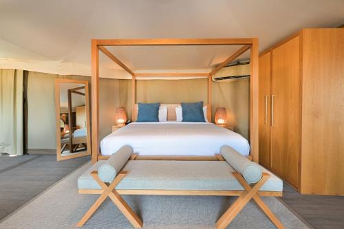 Cama o camas de una habitación en Kingfisher Retreat by Sharjah Collection