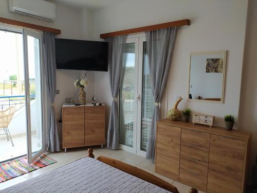 Ένα ή περισσότερα κρεβάτια σε δωμάτιο στο Appartment Enjoy Sea View