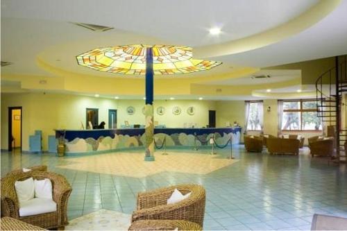 Swimmingpoolen hos eller tæt på Villaggio Stella Maris