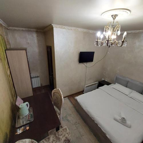 Camelot hotelにあるベッド