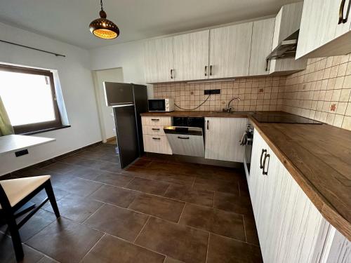 Η κουζίνα ή μικρή κουζίνα στο Penny Apartmanok Szigetvár