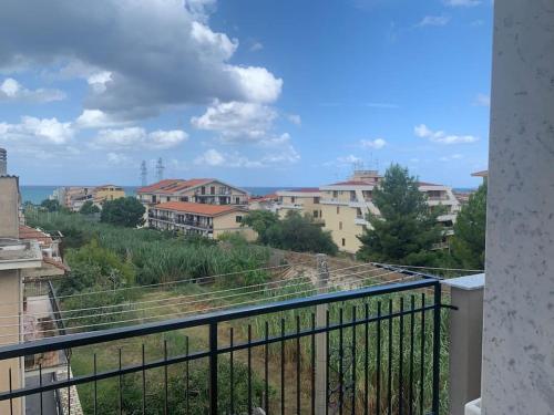 a view of a city from a balcony at Appartamento 300m dal mare AMANTEA CALABRIA in Amantea