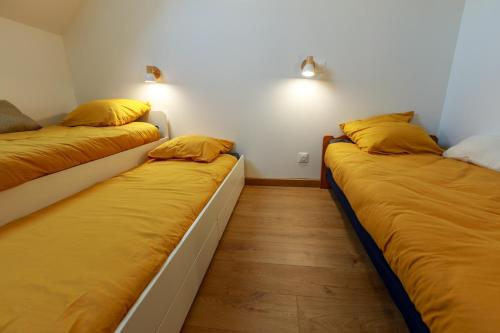 Cama o camas de una habitación en Gite du biziou