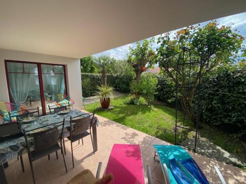 Appartement de charme T3 avec petit jardin et parking