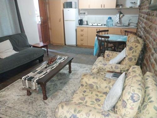 a living room with a couch and a coffee table at Fossil Hills in McGregor