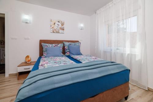 Katil atau katil-katil dalam bilik di Villa Panoramablick