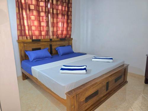 Postel nebo postele na pokoji v ubytování Kandy Royal Resort