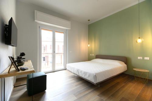 Postel nebo postele na pokoji v ubytování Bianca Elegance Rooms
