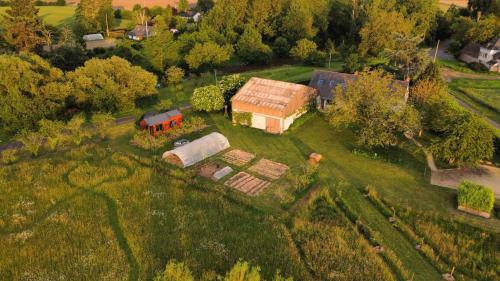 an aerial view of a farm with a barn at Simples Escales : gîte nature, détente et sauna in Les Rosiers-sur-Loire