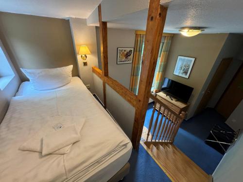 Postel nebo postele na pokoji v ubytování Hotel Bodeblick