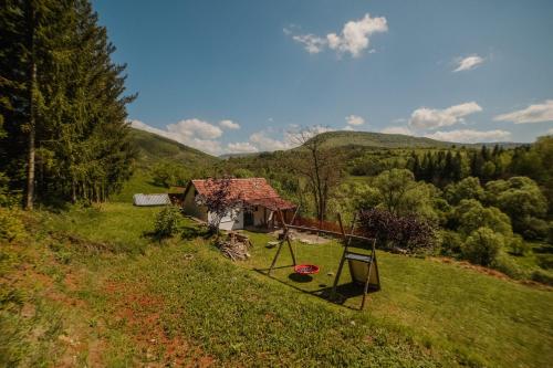 a house in the middle of a field at Kuca Lula Stara planina in Pirot