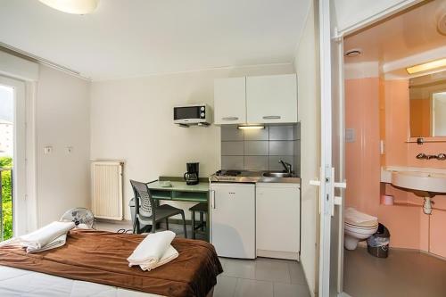 Ένα μπάνιο στο Appart Hotel Corte HR