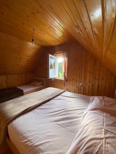 Krevet ili kreveti u jedinici u okviru objekta Guest House Dzajovic