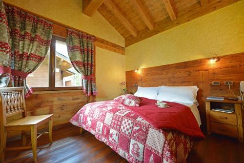 Postel nebo postele na pokoji v ubytování Hotel Le Petit Abri