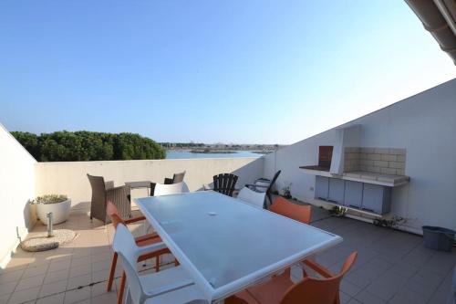 Photo de la galerie de l'établissement Le Paul Emile vue splendide sur le lac, au Grau-du-Roi