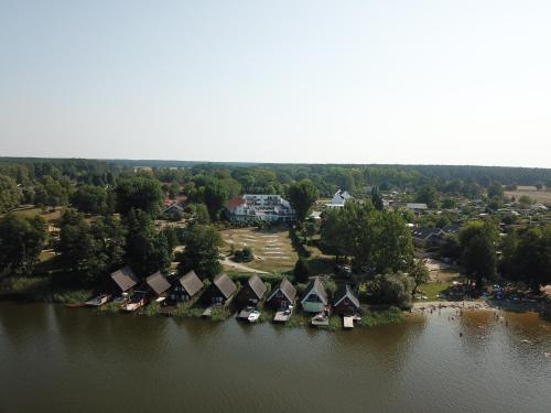 an aerial view of a row of houses on the water at Strandläufer Classic 215 in Granzow