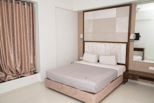 Katil atau katil-katil dalam bilik di Hotel Executive Silver Inn