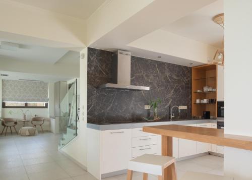Kuchyňa alebo kuchynka v ubytovaní Miraida Exclusive Residence