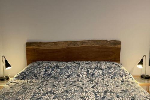 Un pat sau paturi într-o cameră la My Place in Como