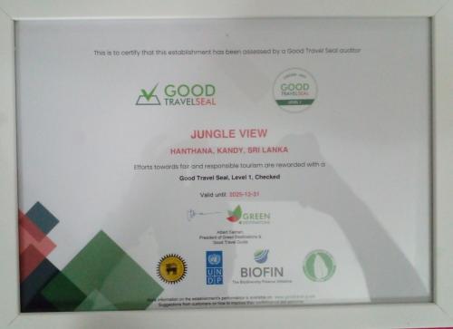 a sign for a good travel agency with a website at Hanthana Jungle View Holiday Home in Kandy