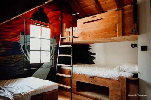 Postel nebo postele na pokoji v ubytování La Maison de Marie
