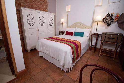 Ένα ή περισσότερα κρεβάτια σε δωμάτιο στο Hotel Bantu by Faranda Boutique, a member of Radisson Individuals