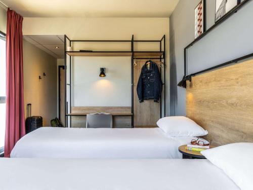 Postel nebo postele na pokoji v ubytování Ibis Marseille Marignane Technopole