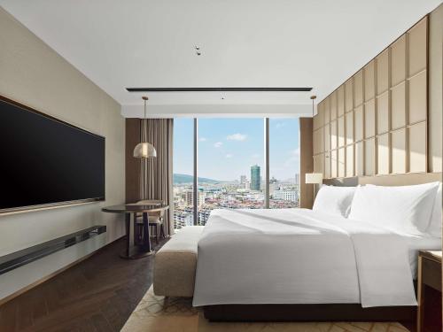 Cama o camas de una habitación en Hilton Changshu