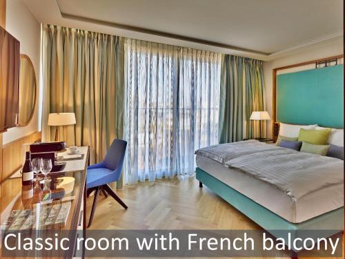 EST Grand Hotel Savoyにあるベッド