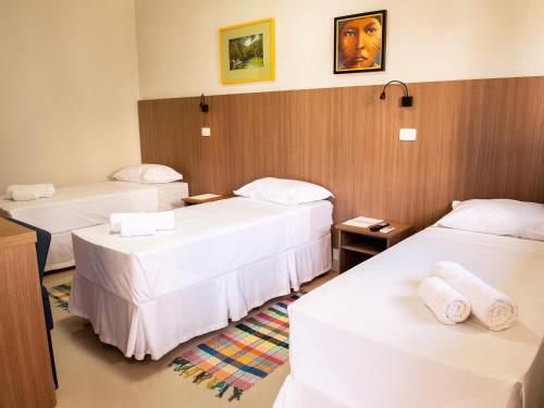 Кровать или кровати в номере CLH Suites Bonito Centro