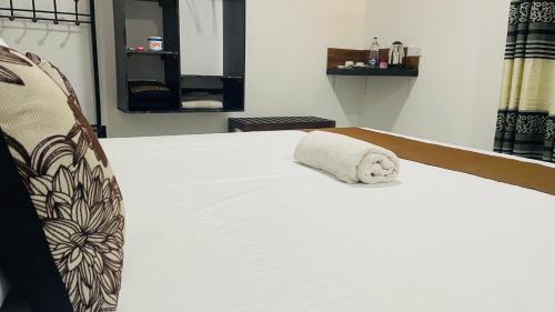 Postel nebo postele na pokoji v ubytování Sigiri Suncap Cottage