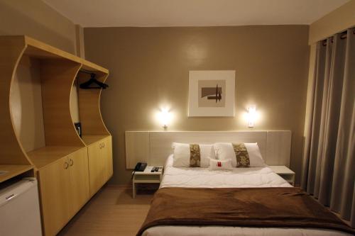 Katil atau katil-katil dalam bilik di Hotel Curi Executive