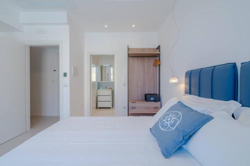 Ein Bett oder Betten in einem Zimmer der Unterkunft Dimore delle Zagare Molo