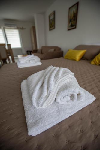 Кровать или кровати в номере Apartmani Rosica